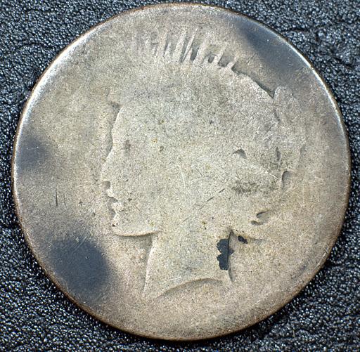 Peace-Dollar-Been-Through-Fire?